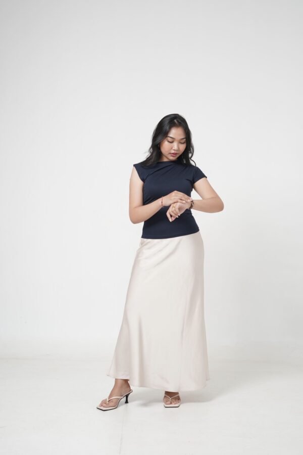 Effortlessly elegant, the Aura Drape shirt enhances your natural silhouette with its sculpted fit and graceful draped neckline